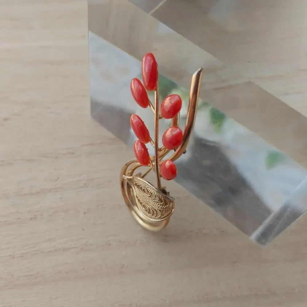 Vintage dark coral and gold tone floral spiral brooch